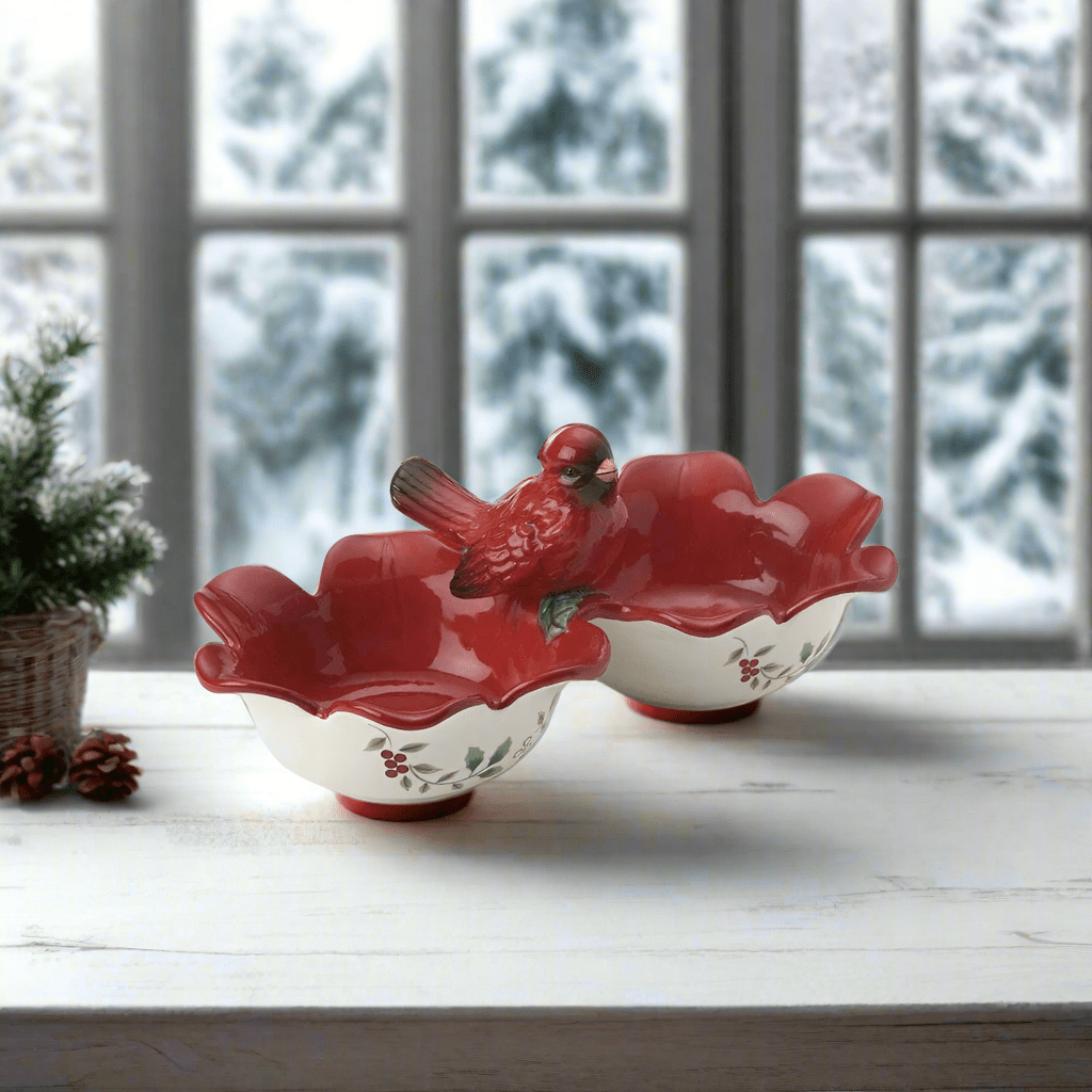 Close-up of the two-section ceramic serve bowl showing its detailed cardinal design