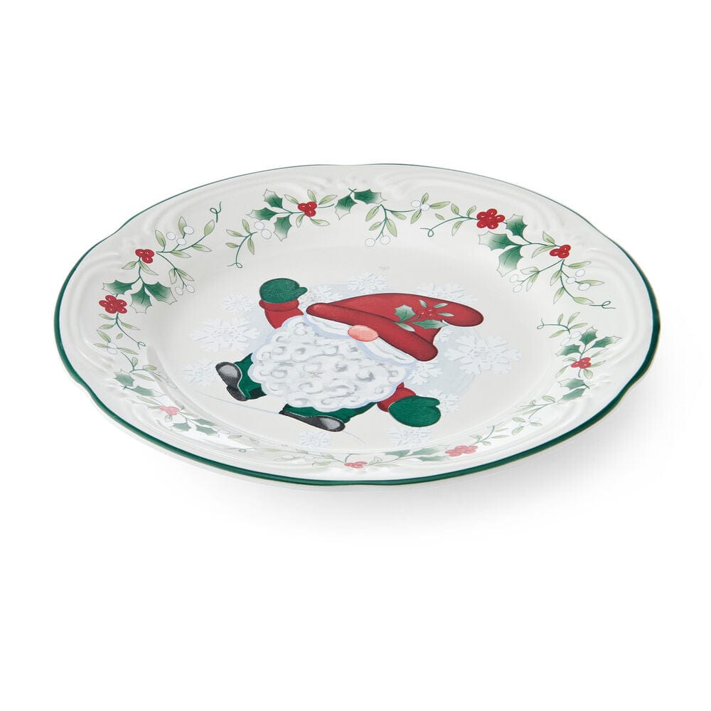Festive holiday dinner table with Christmas salad plates and gnome dinnerware
