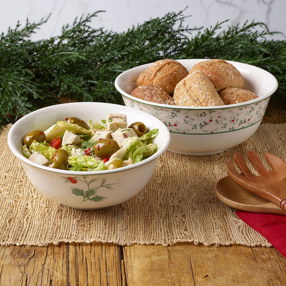 Holly pattern serving bowl displaying festive design with berries.