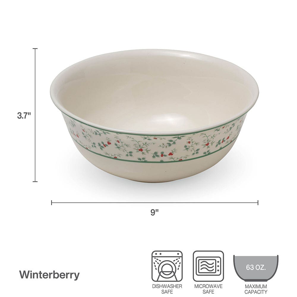 Close-up of stoneware bowl showcasing intricate holly details.