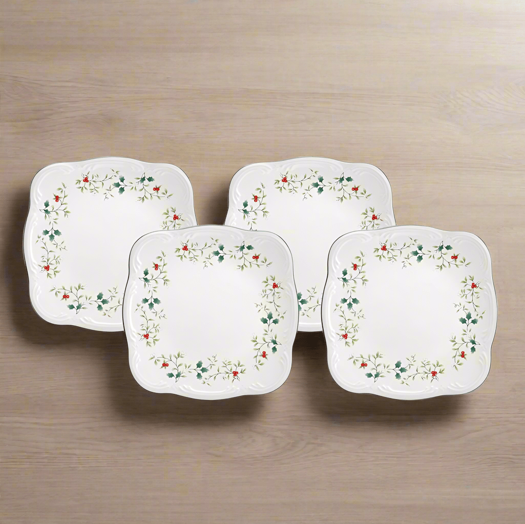 Set of four 10-inch stoneware square dinner plates showcasing a modern design.