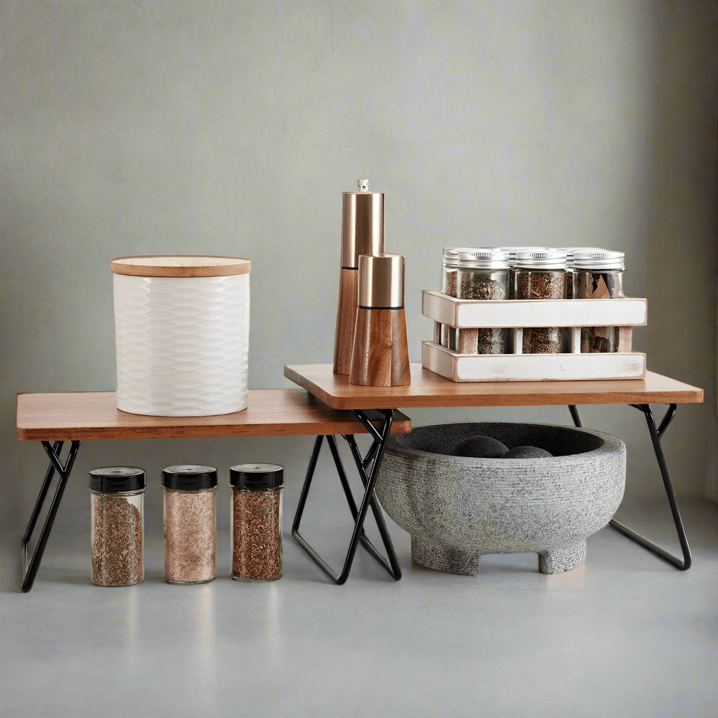 Close-up of wooden shelf trays with black wire stands for kitchen storage