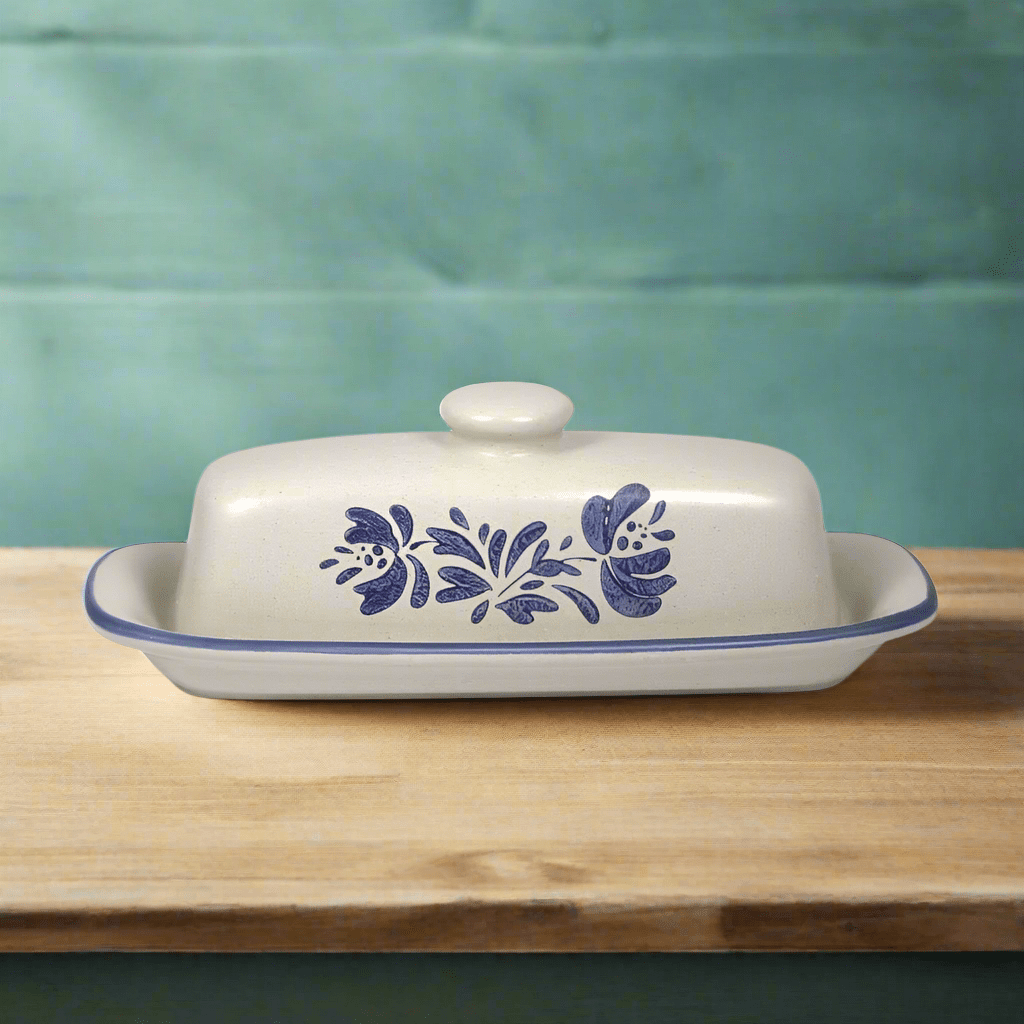 Covered butter dish with lid, demonstrating its capacity and versatility as a cheese tray.