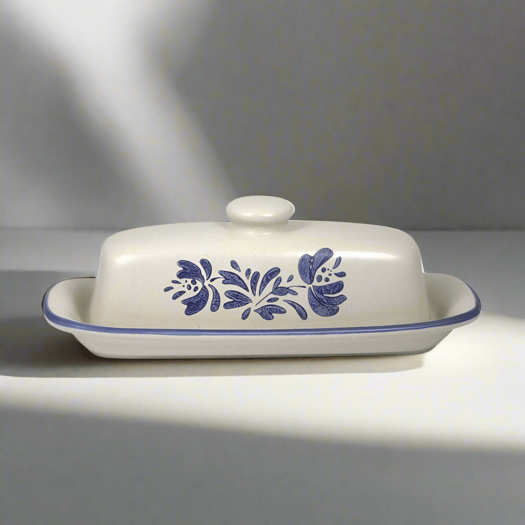 Yorktowne stoneware butter dish showcasing its elegant design and functionality.