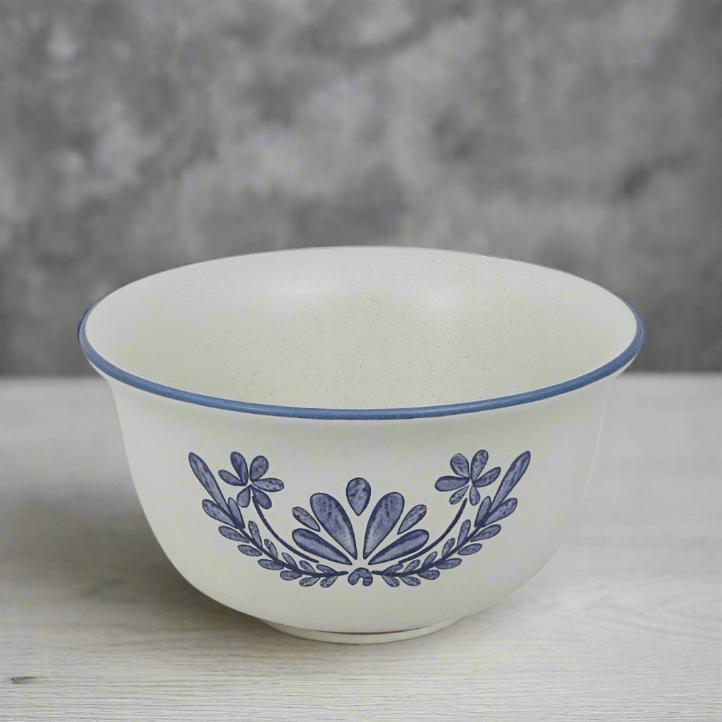 Deep stoneware soup and cereal bowl with a modern design on a dining table