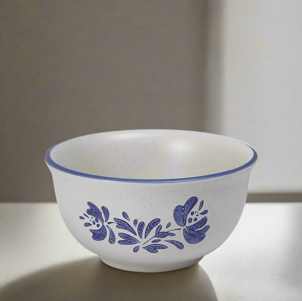 Close-up of Yorktowne stoneware dessert bowl with desserts inside, showing the elegant design