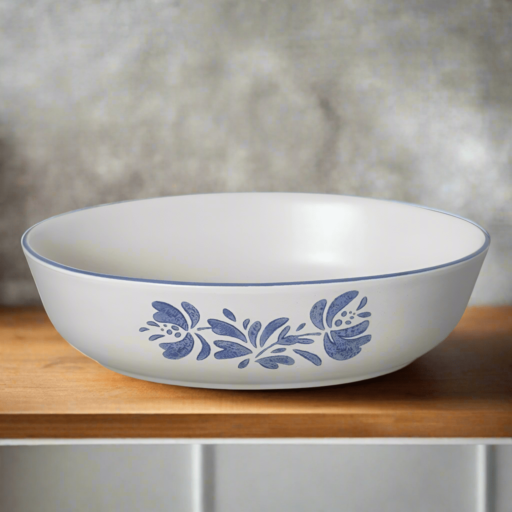 Close-up of the oval serve bowl showing its textured stoneware surface