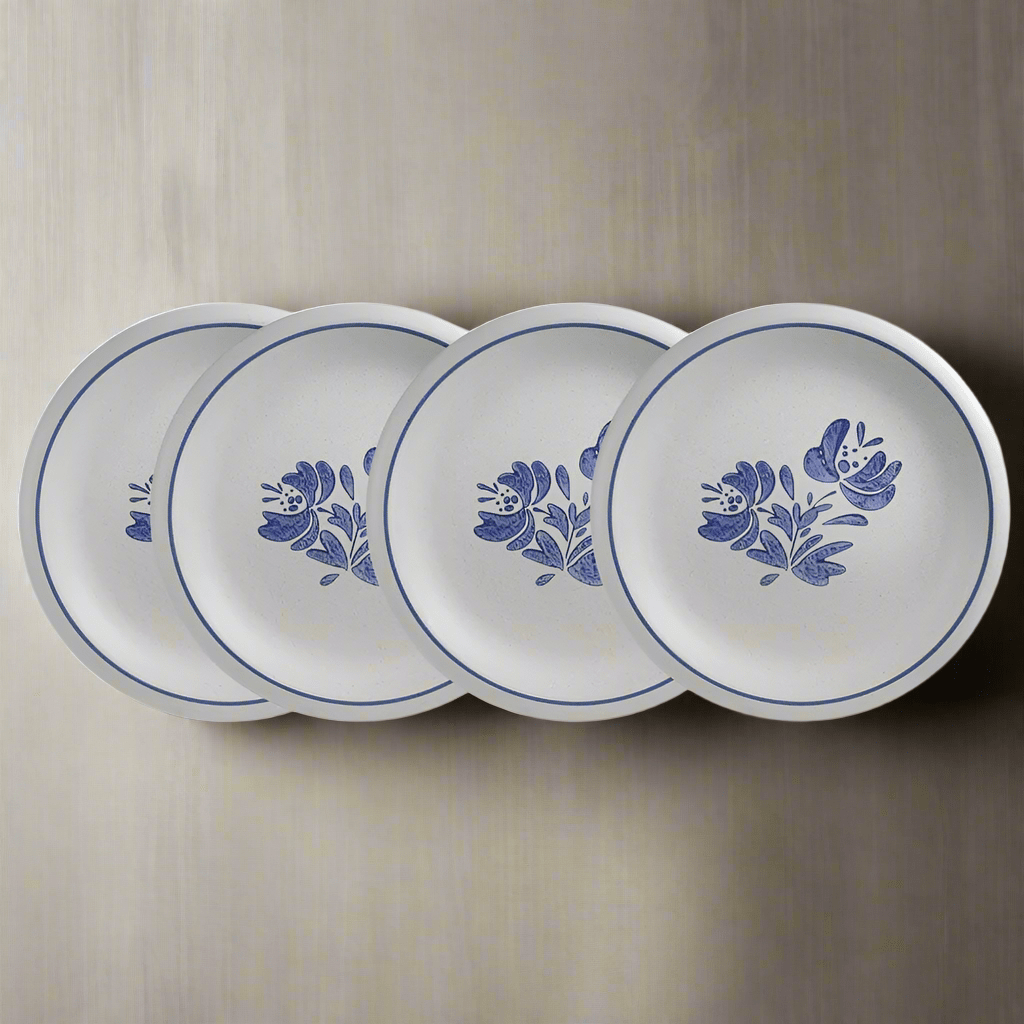 Close-up of 10-inch stoneware dinner plates stacked neatly