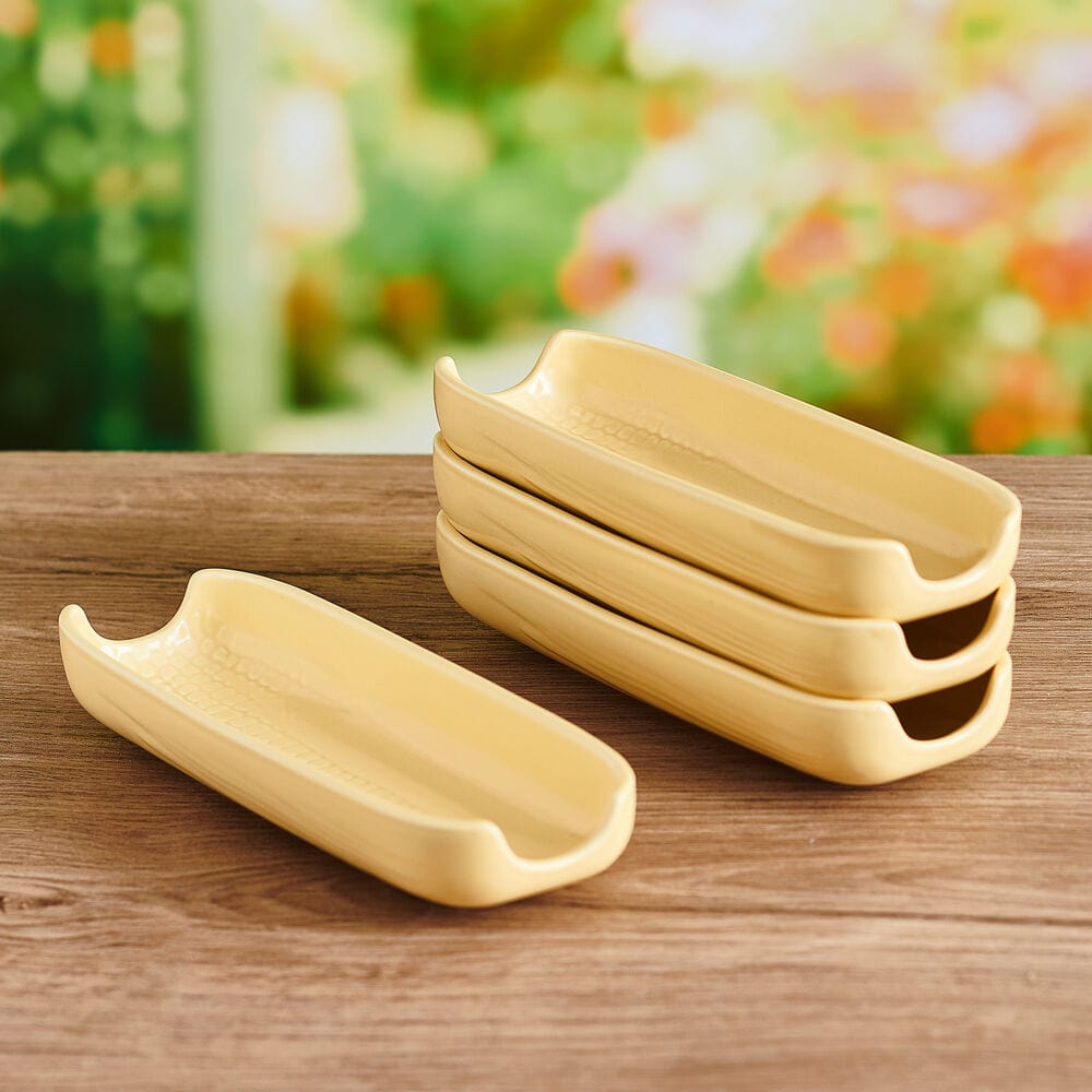 Close-up of Callie Yellow corn serving dishes showing the ear of corn design