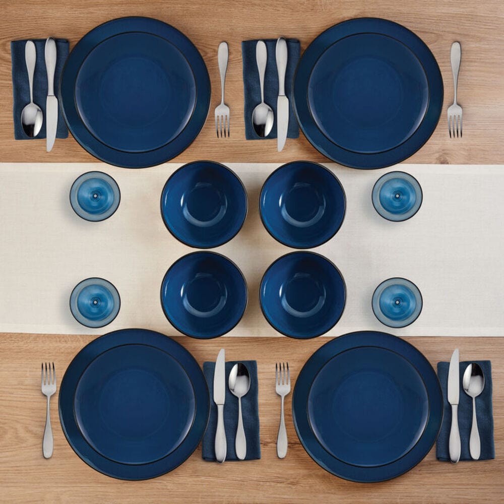Vibrant blue interior coupe-shaped dinner plate on table setting
