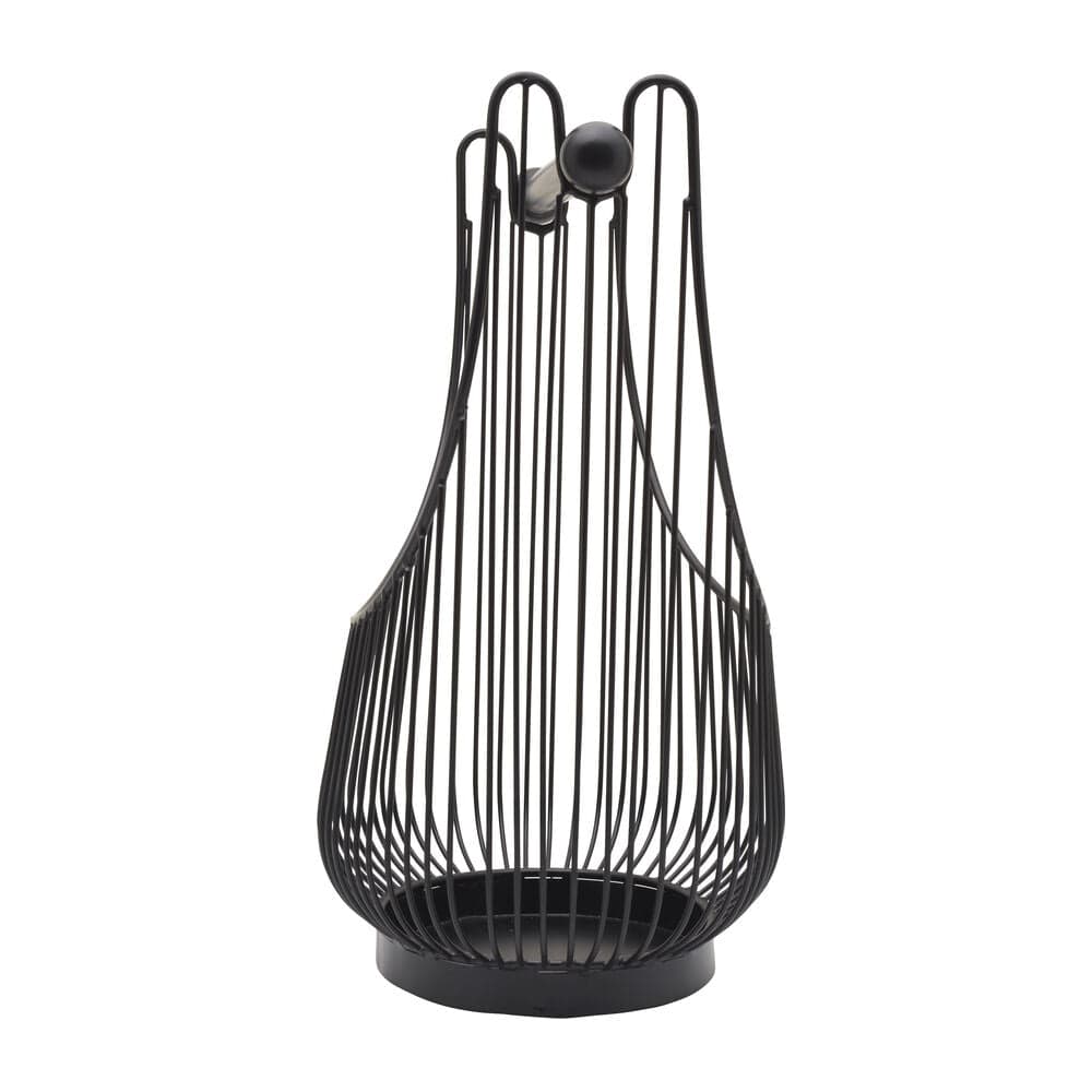 Organized kitchen countertop with fruits and towels in the spindle storage organizer