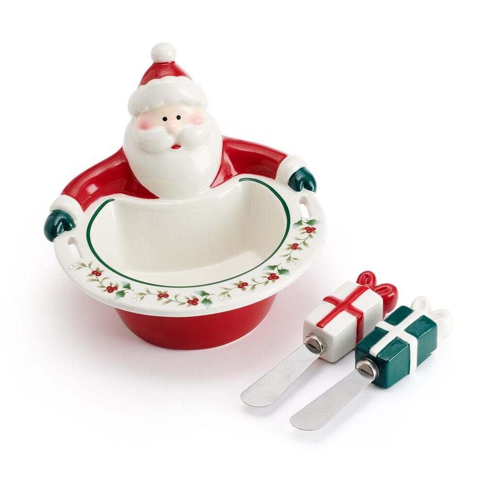 Festive holiday table setup featuring Santa dip bowl and seasonal dishware