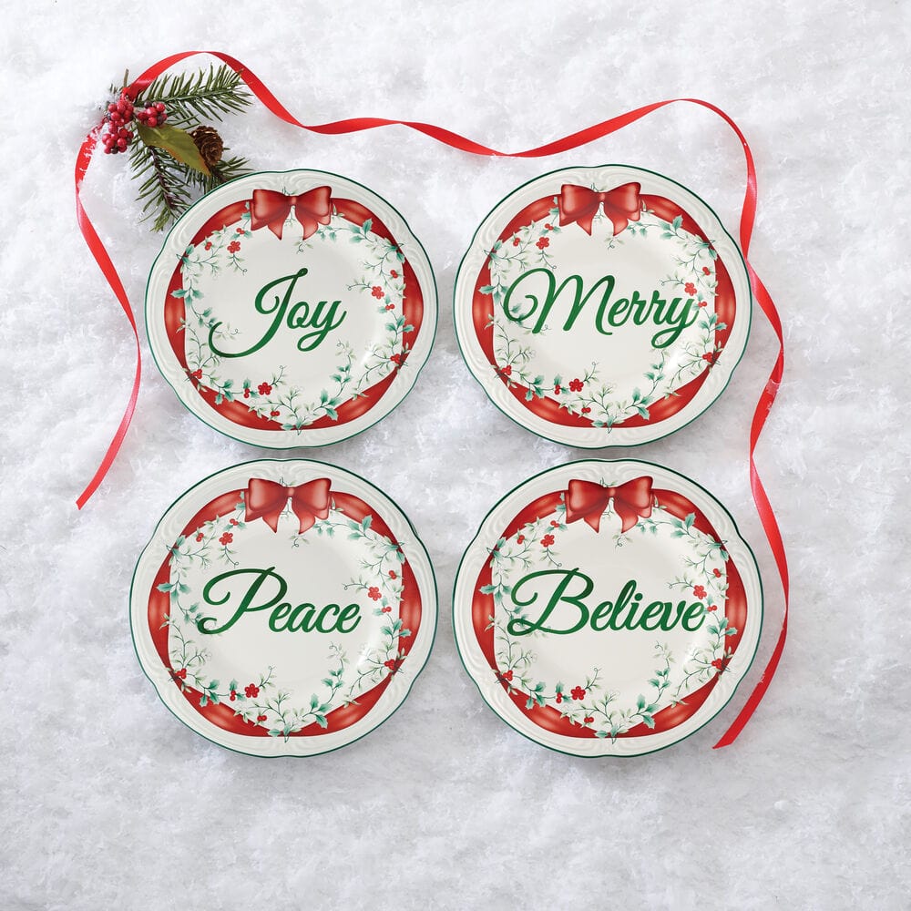 Salad plates elegantly arranged on a festive holiday table setting