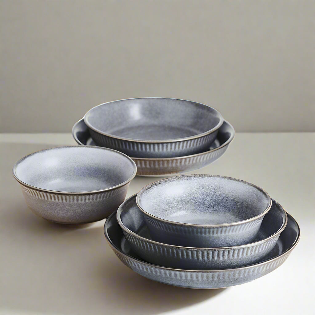 Close-up of the Amara Slate pasta bowl highlighting the semi-matte finish and distinctive color variations.