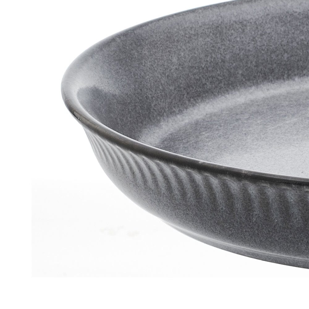 Amara Slate dinner bowl set displayed on a dining table, showcasing unique ceramic bowls for serving.