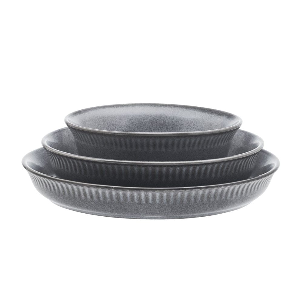 Full set of Amara Slate bowls arranged artistically, perfect for a cozy dinner for two.