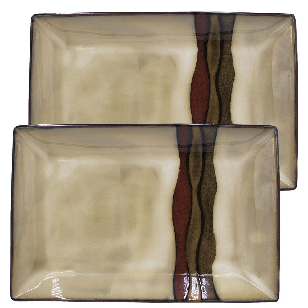Vibrant Aztec stoneware platter with reactive glaze and earth tones, ideal for serving dinner