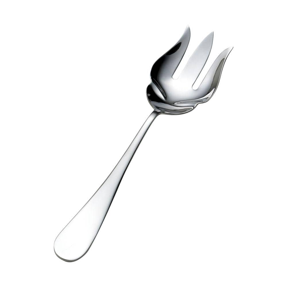 Salad serving fork in use, elegantly serving a fresh green salad.