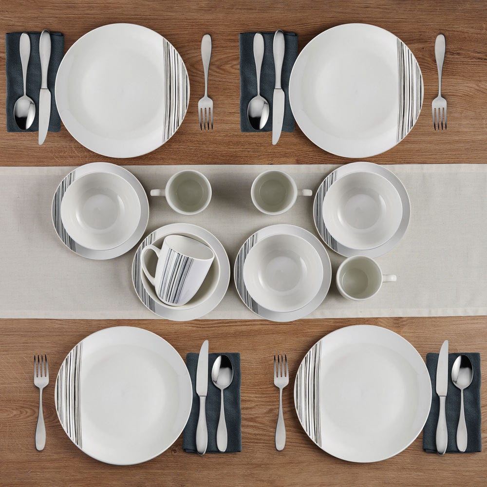 Black and white dinnerware online, includes plates, bowls, and mugs in a sophisticated style