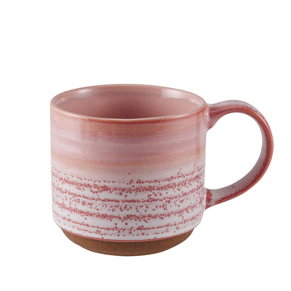 Close-up view of the brushed line design on a colorful stoneware mug, highlighting its craftsmanship and texture.