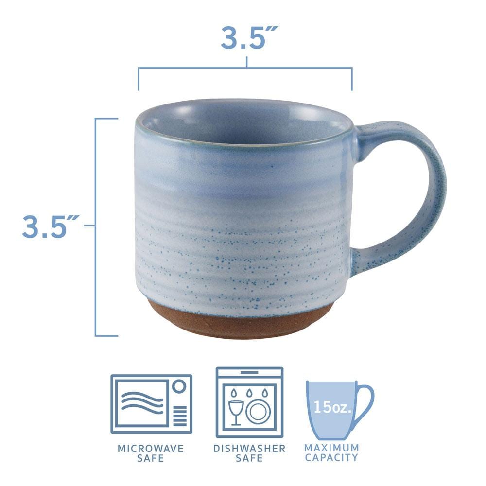 A hand holding a microwave safe reactive mug filled with coffee, demonstrating its practical use in daily life.