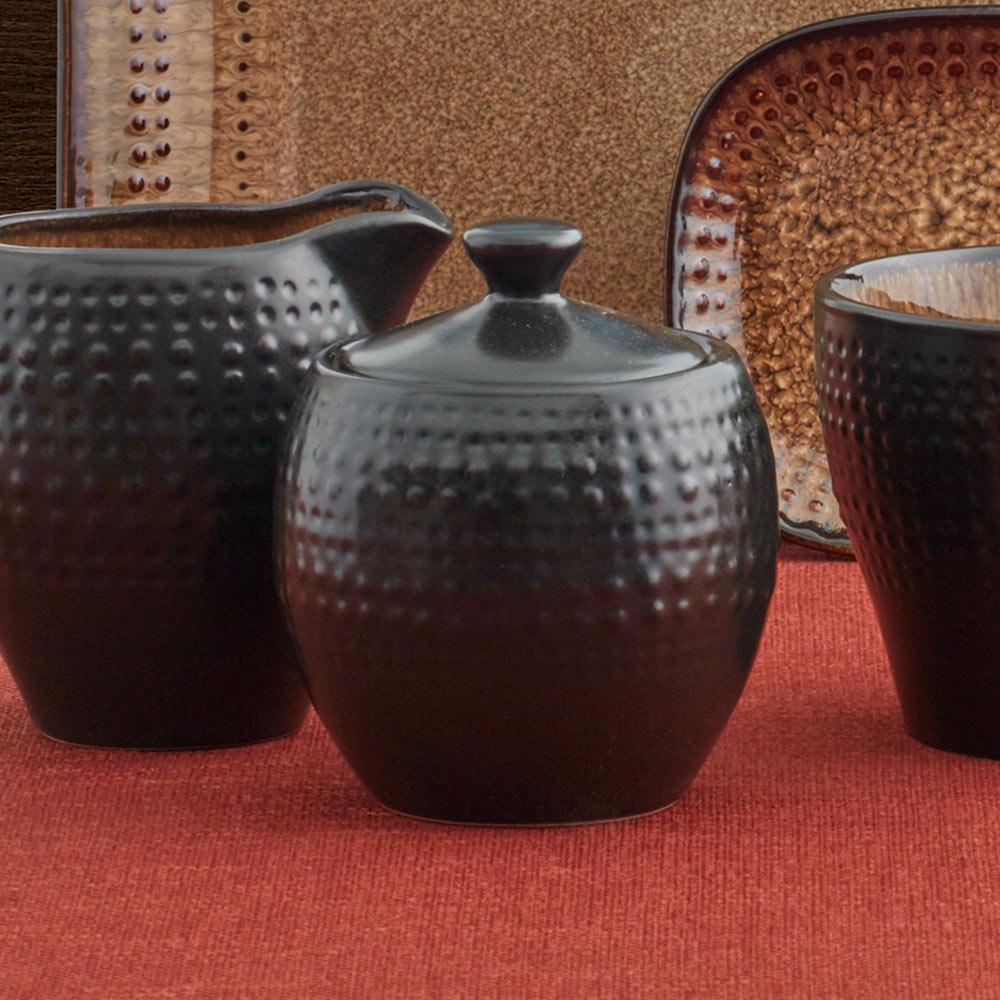 Close-up of Cambria stoneware sugar bowl with lid showing reactive glaze finish