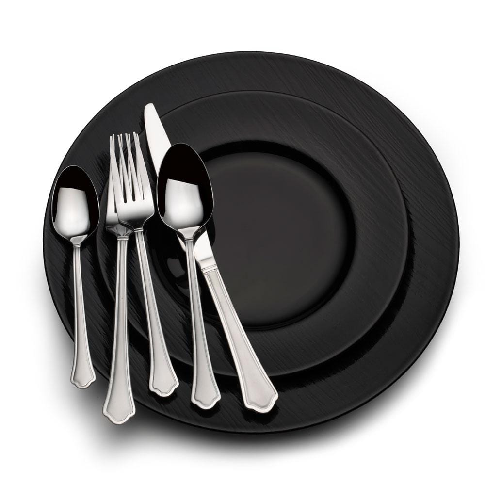 Dishwasher-safe stainless steel flatware set in a modern kitchen