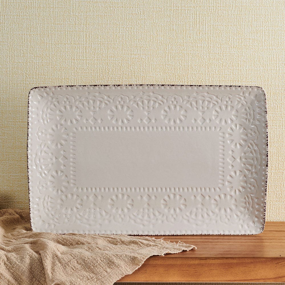Chateau Cream serving platter showcasing scalloped edge and lace design from above.