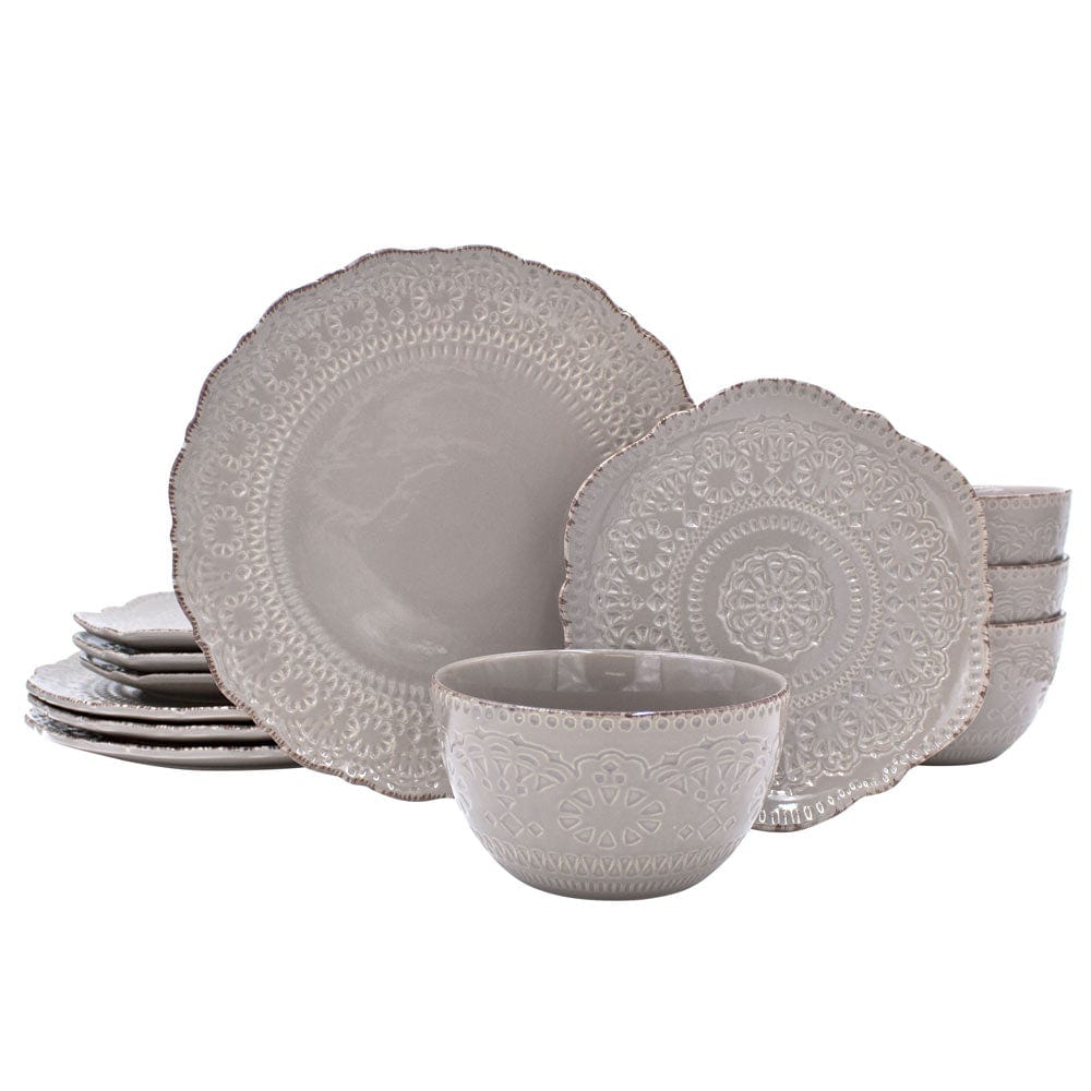Set of four stoneware dishes arranged on a modern dining table for everyday use