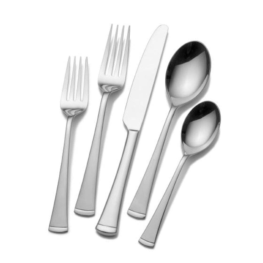 Flatware service for 8, including dinner and salad forks, knives, and spoons, for elegant dining