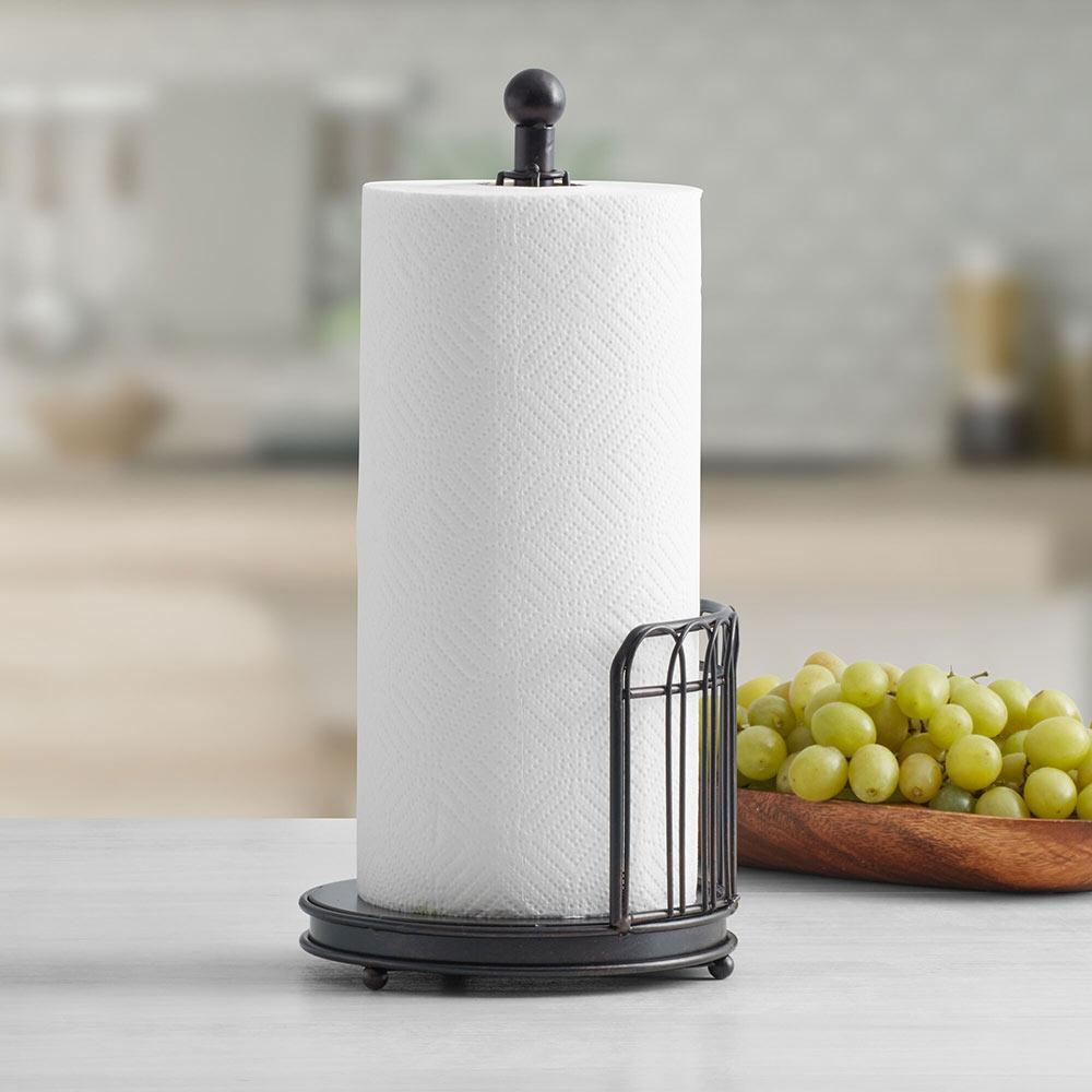 Rustic iron paper towel holder showcasing its elegant design on a kitchen countertop.