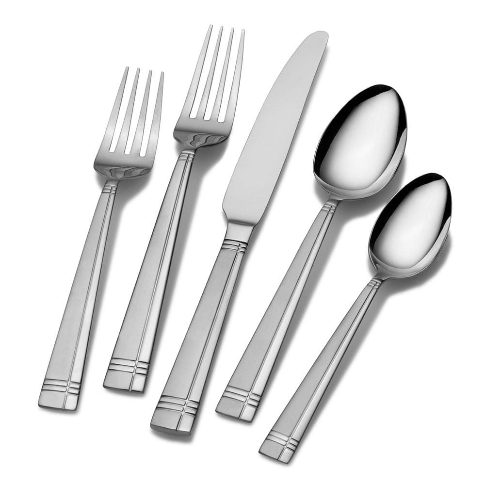 Set of Dawson Frost stainless steel flatware arranged for family dinner
