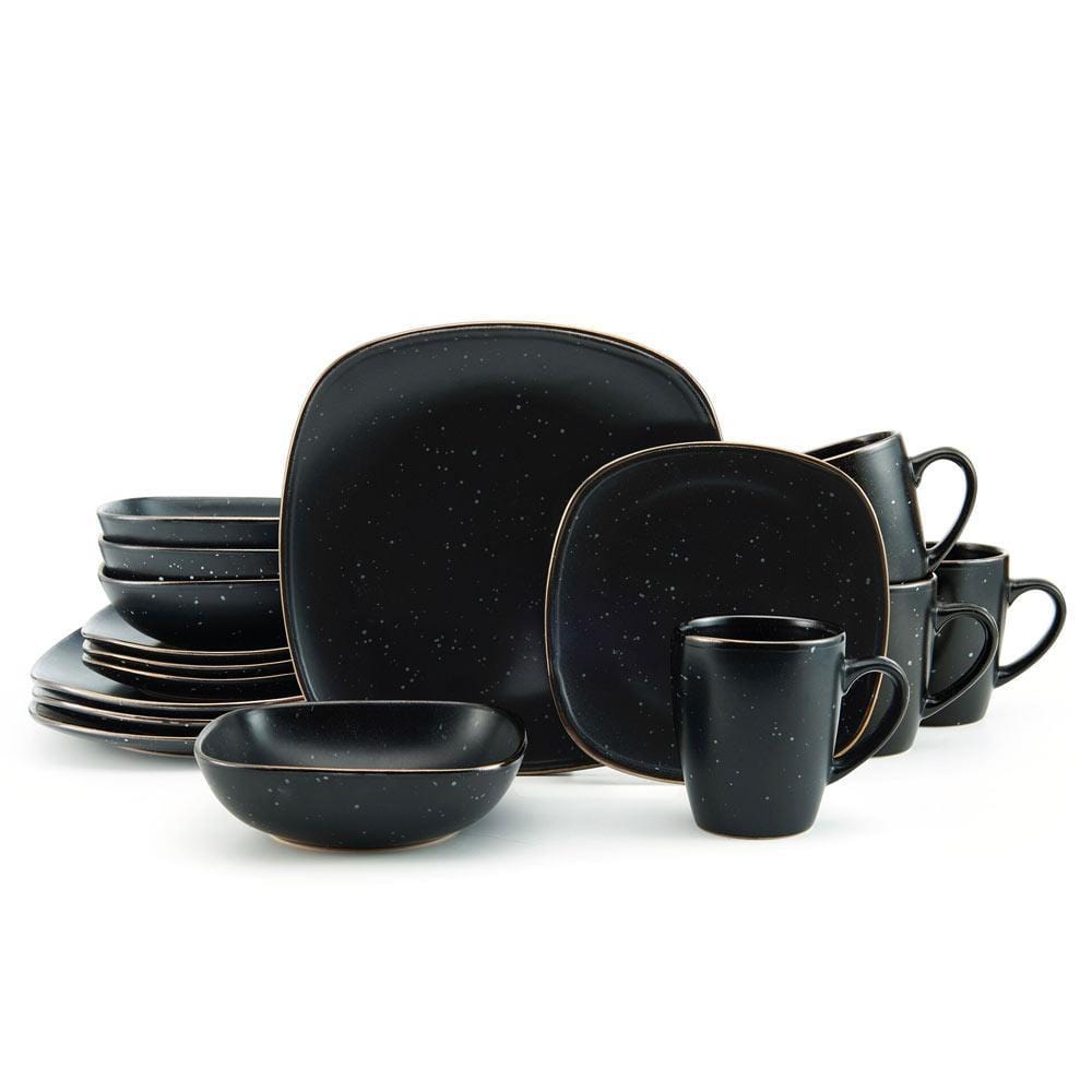 Set of 4 dinner plates, bowls, and mugs in sleek black stoneware, ideal for casual and formal dining