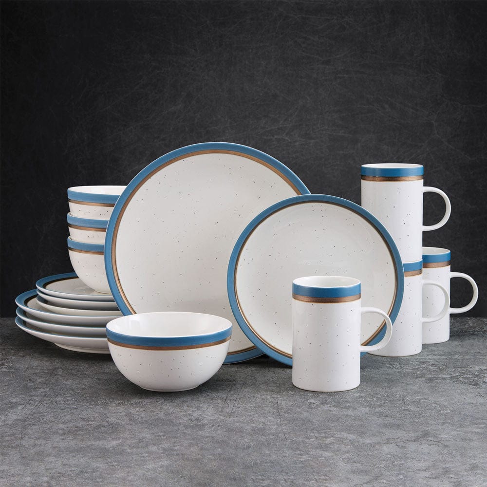 Close-up of Ezra Blue dinnerware set showcasing speckle pattern and metallic accents