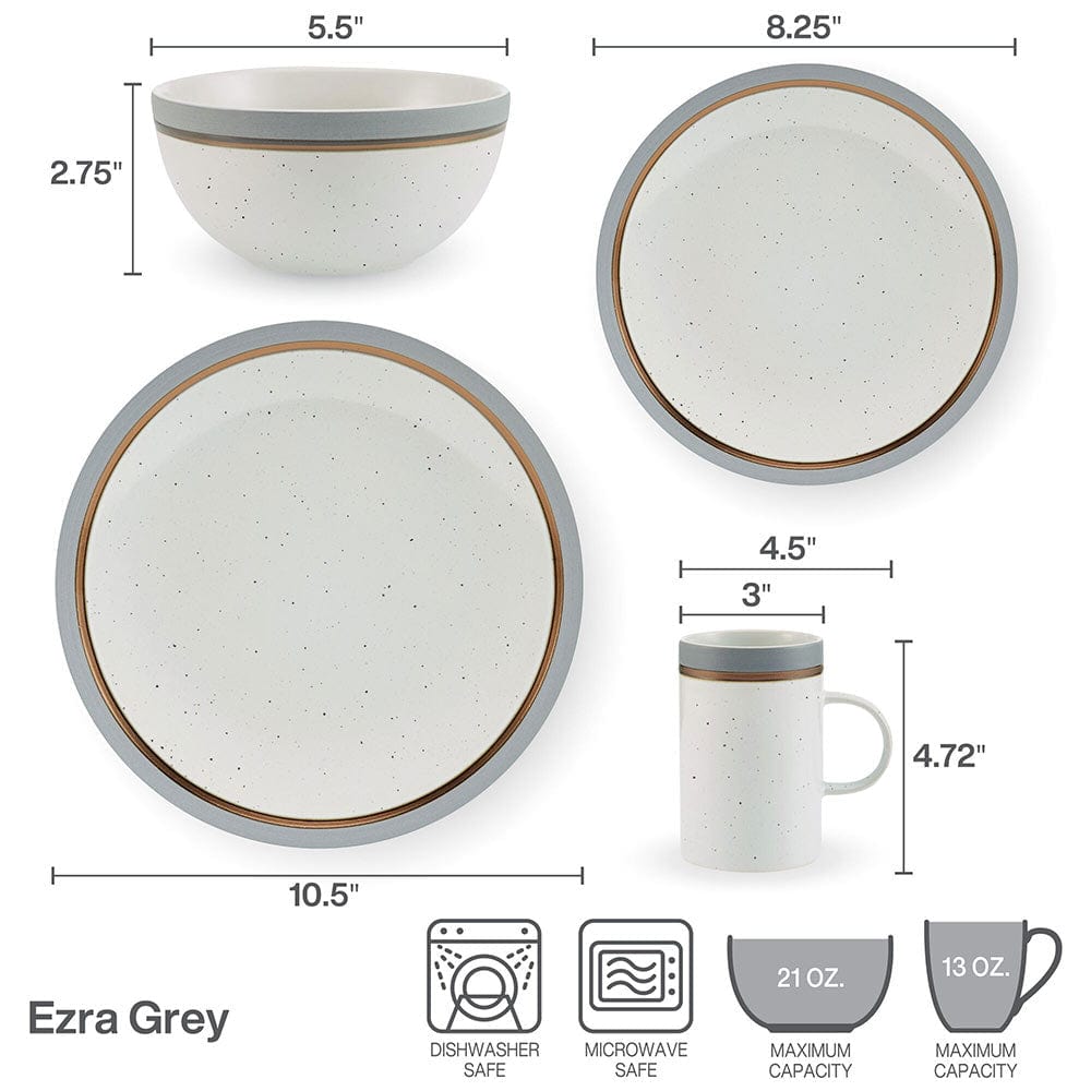 Modern speckled dinnerware set displayed on a dining table, showcasing plates and bowls.