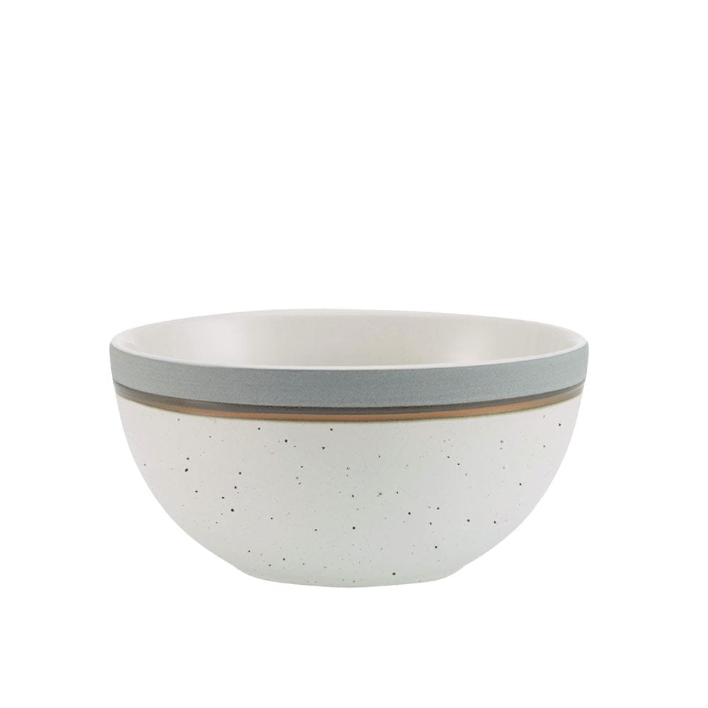 Modern speckled dinnerware set displayed on a dining table, showcasing plates and bowls.