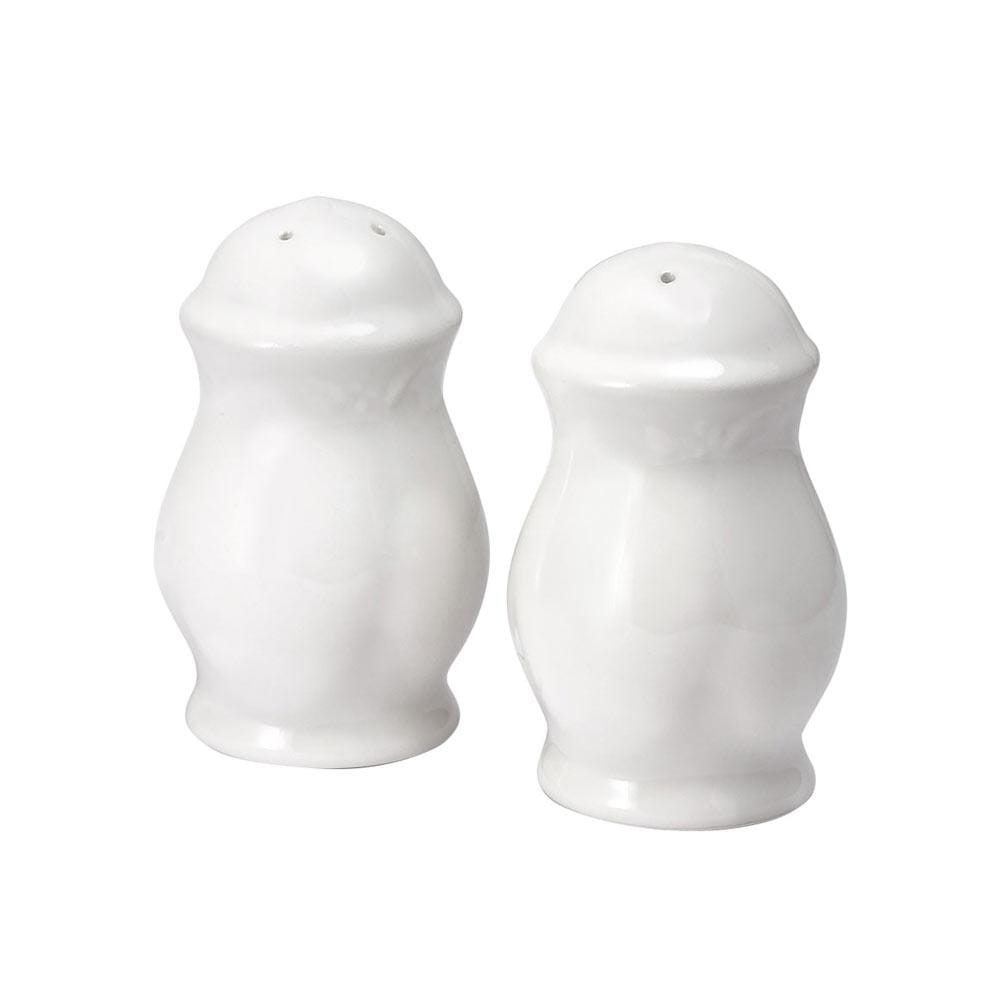 Close-up of decorative salt and pepper containers showcasing intricate craftsmanship.