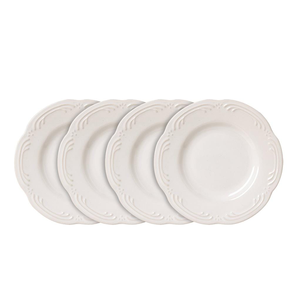 A beautifully set table featuring the stoneware dessert plates with delectable desserts.