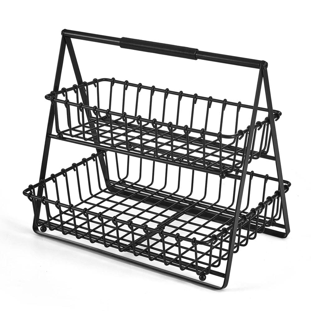 Two-tier black metal storage basket filled with fresh fruits on kitchen counter
