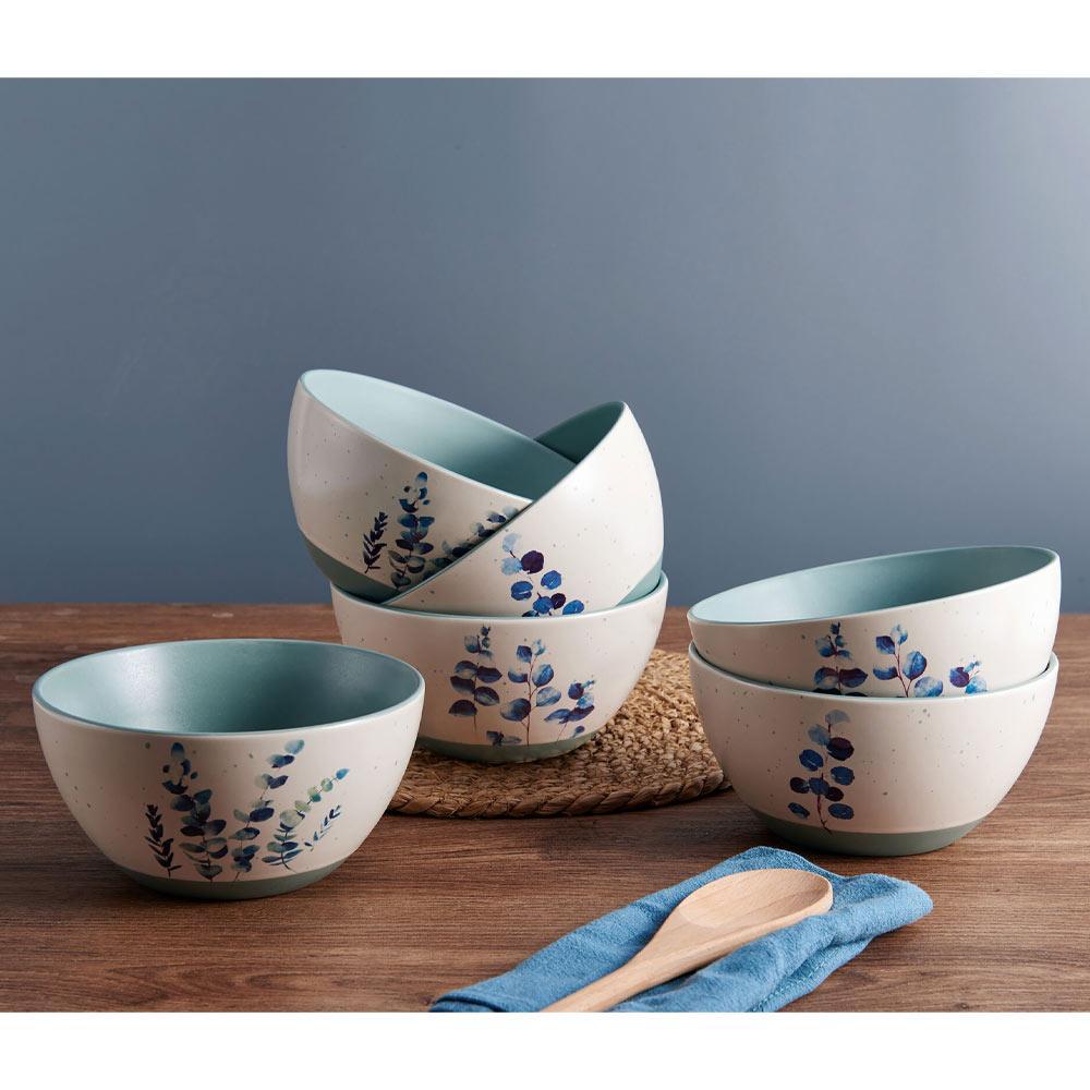 Close-up of the matte speckled glaze finish of the Floral Blue Stoneware Bowls.