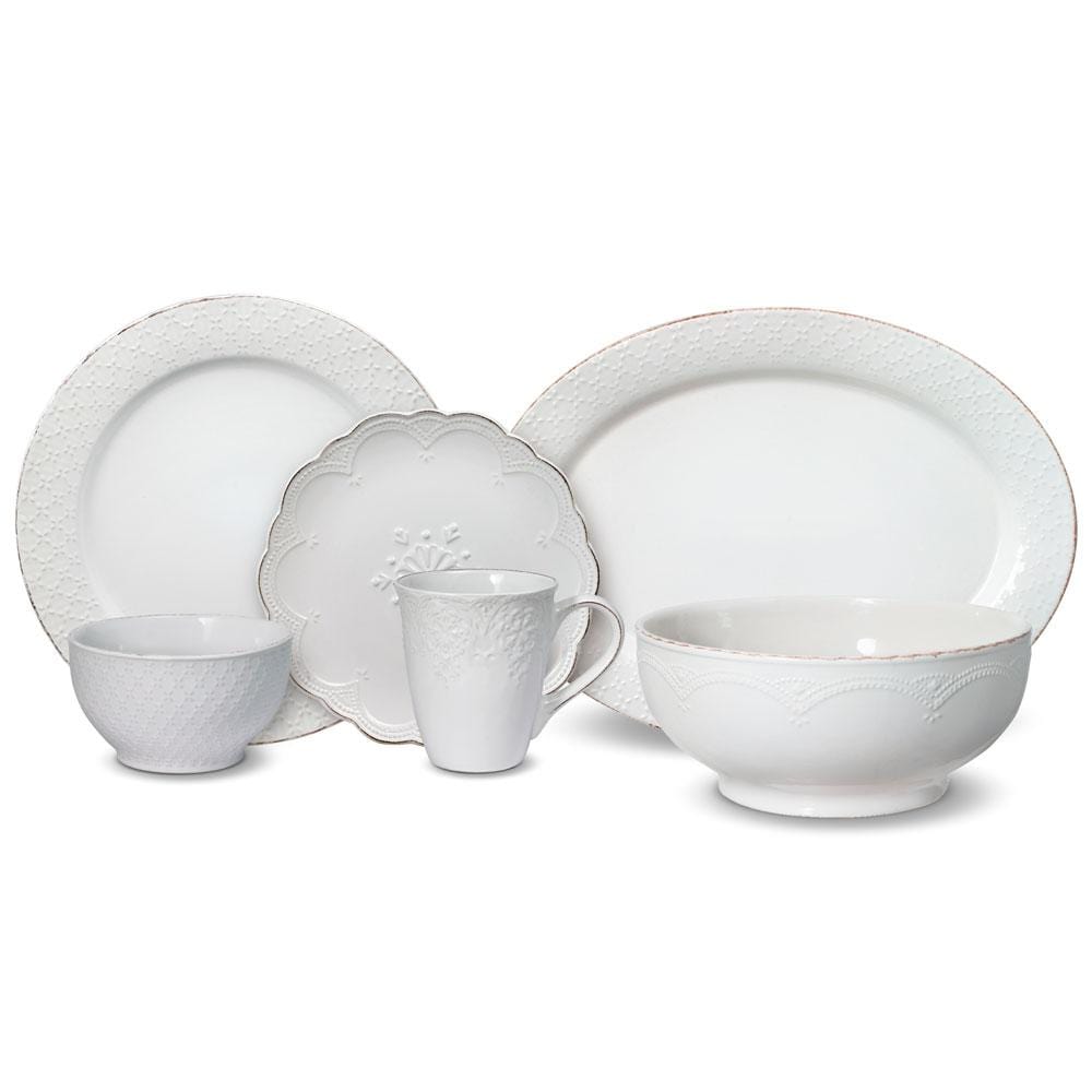 Family enjoying a meal with white serveware and platter