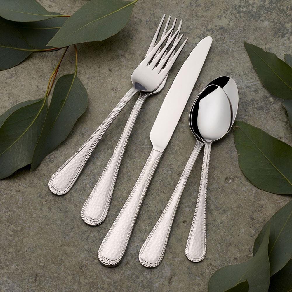 Close-up of hammered stainless steel flatware handles for family dinners