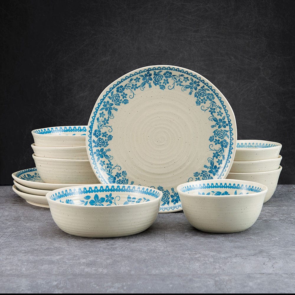 Close-up of Hayden Blue stoneware dinner plate with floral motif and concentric ribbed design