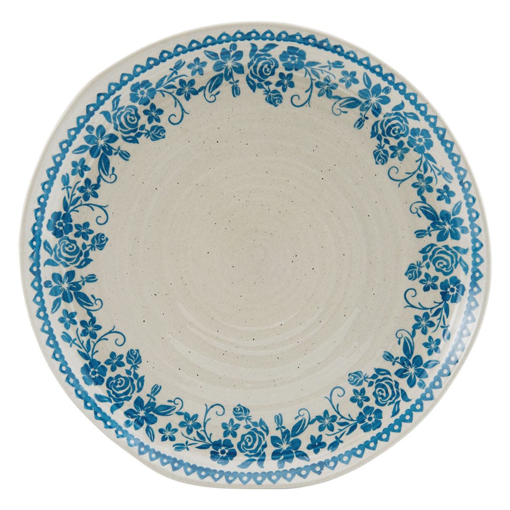 Elegant Hayden Blue bowls and plates stacked, showcasing organic shapes and craftsmanship