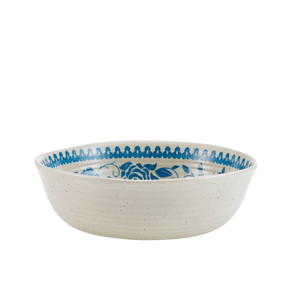 Close-up of Hayden Blue stoneware dinner plate with floral motif and concentric ribbed design
