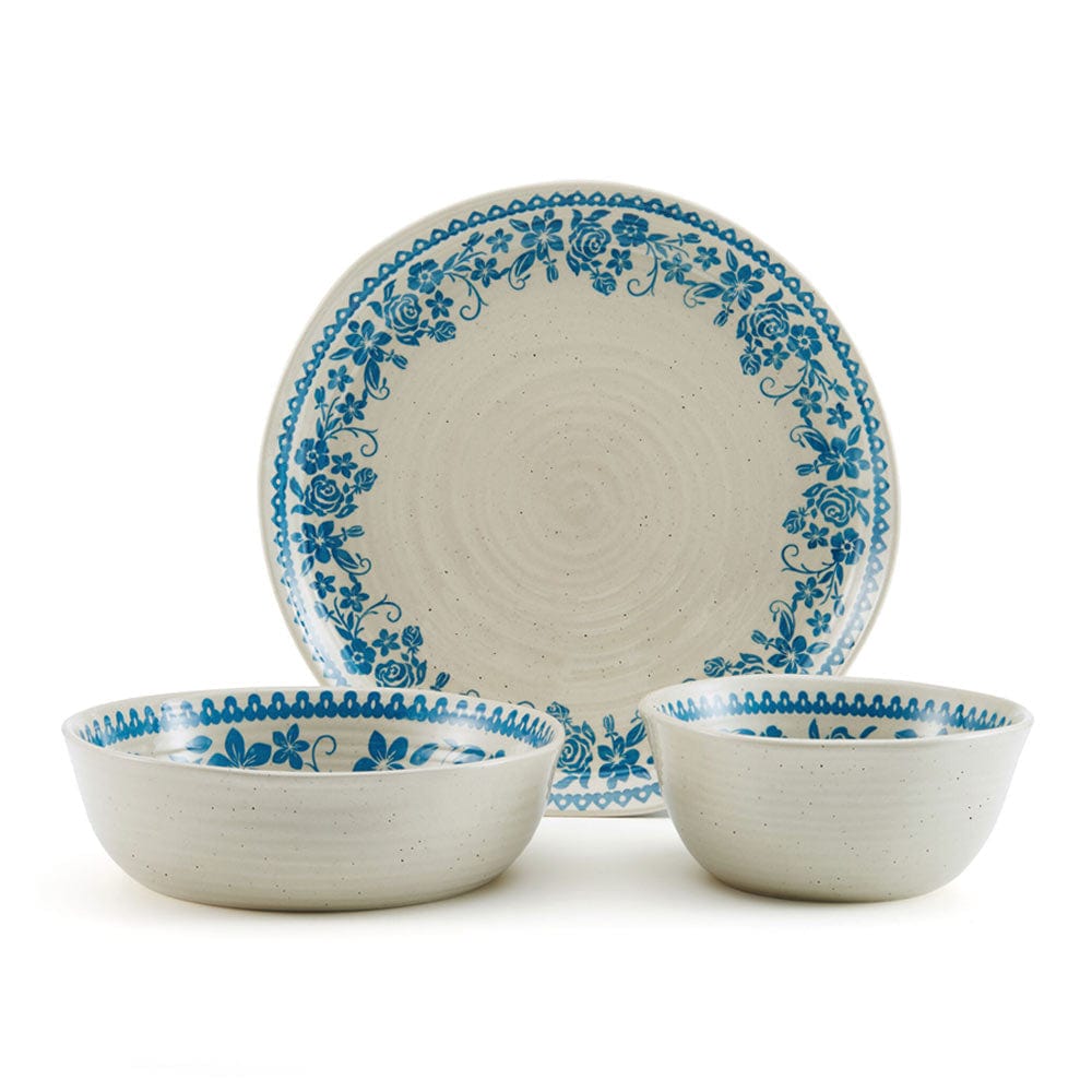 Elegant Hayden Blue bowls and plates stacked, showcasing organic shapes and craftsmanship