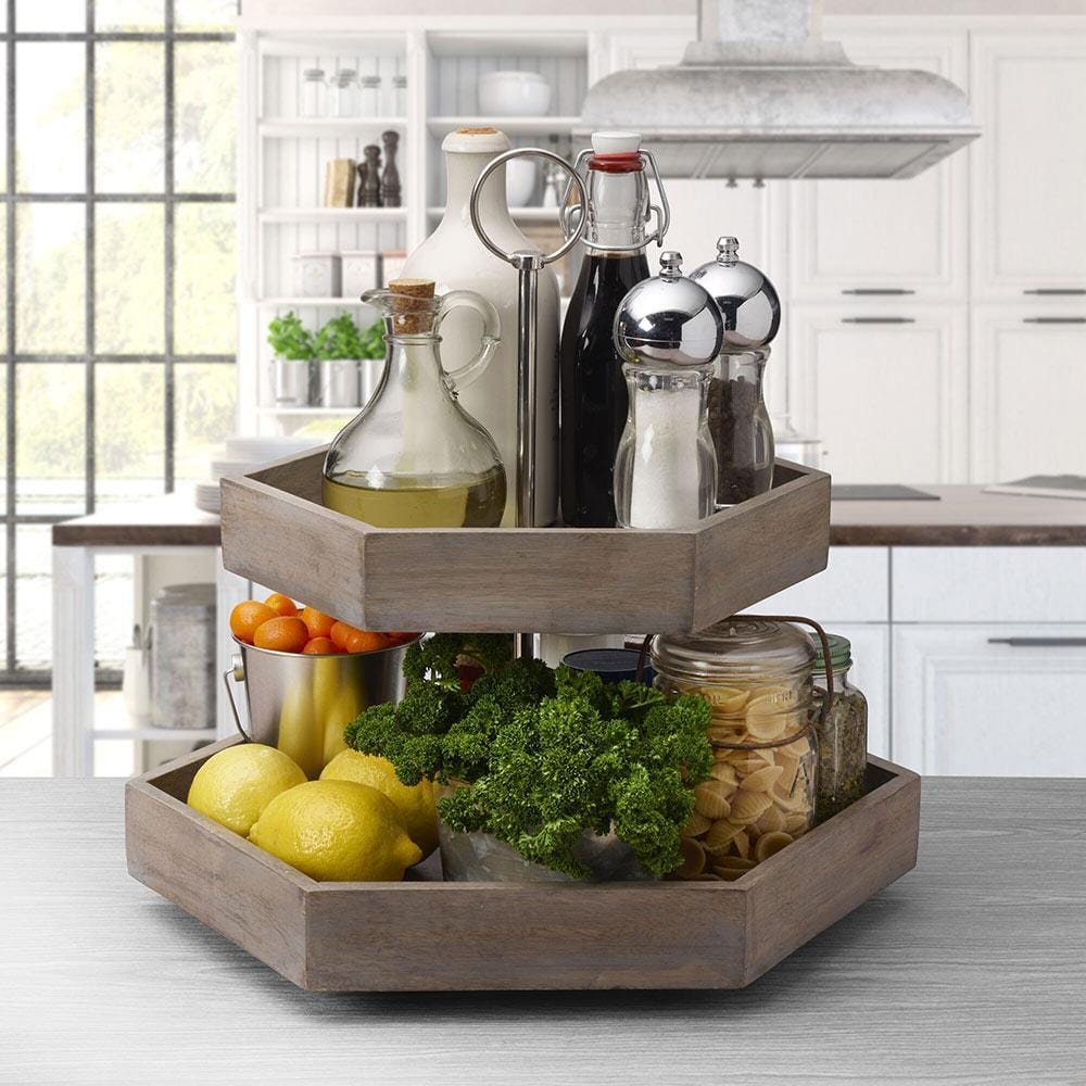 Elegant hexagon tiered mango wood serve tray showcasing appetizers on a buffet table.