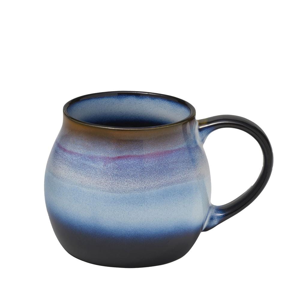 Set of six assorted ceramic mugs with varying designs