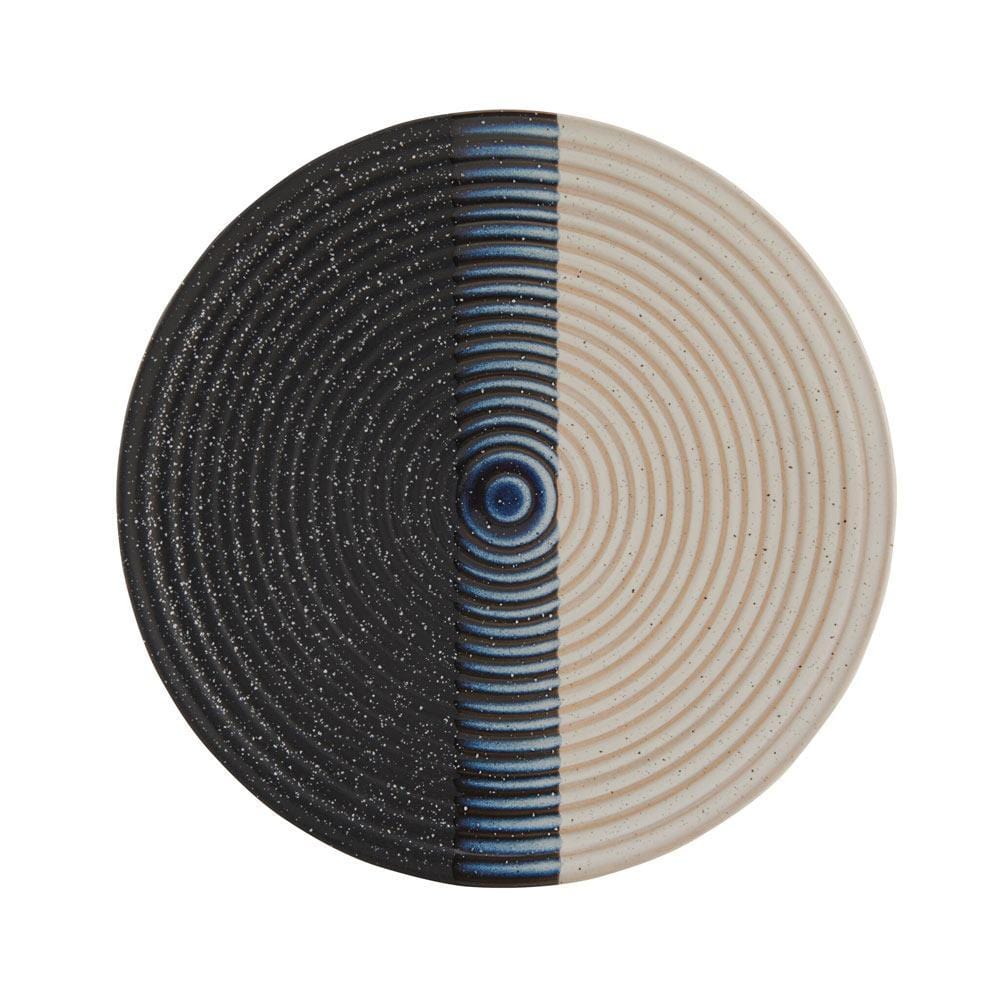 Detail of Jaxon ceramic plates showcasing striated lines and speckle finish