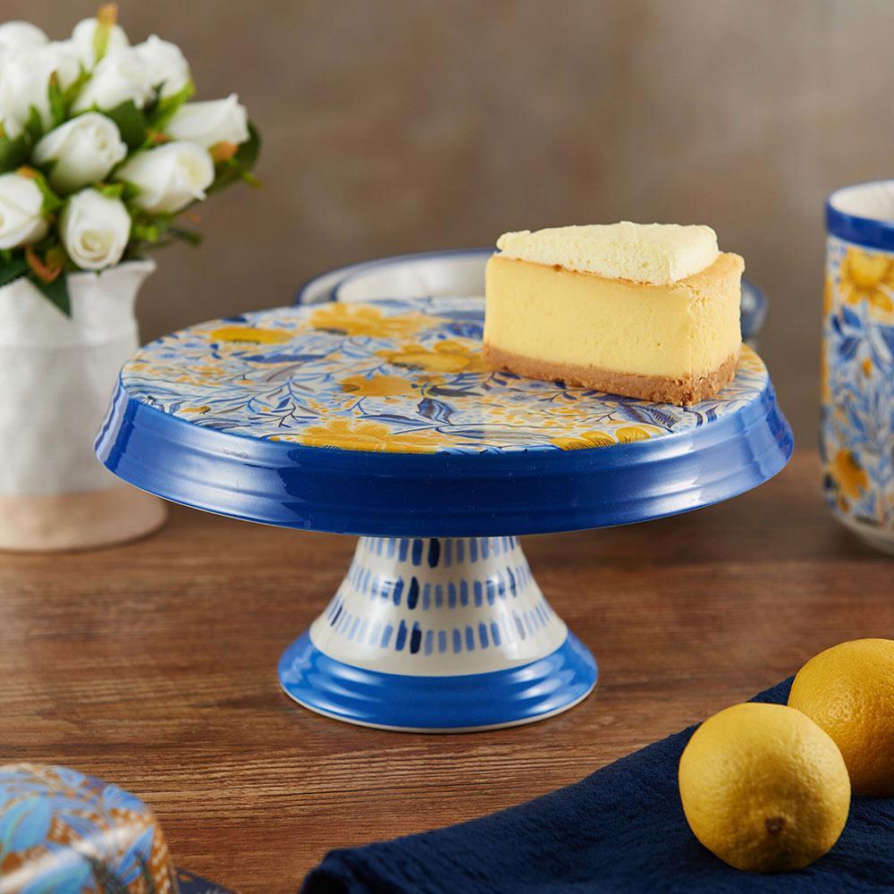 Close-up of Madeline Footed Cake Stand with floral design, perfect for serving desserts